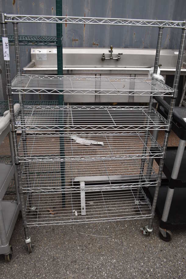 Chrome Finish 6 Tier Wire Shelving Unit on Commercial Casters. BUYER MUST DISMANTLE. PCI CANNOT DISMANTLE FOR SHIPPING. PLEASE CONSIDER FREIGHT CHARGES. 
