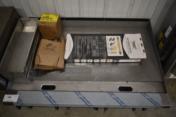 BRAND NEW SCRATCH AND DENT! LATE MODEL! Garland 372GT48GT48N Stainless Steel Commercial Countertop Gas Powered Chrome Top Flat Top Griddle w/ Regency Gas Connection Kit. - Image 4 of 11