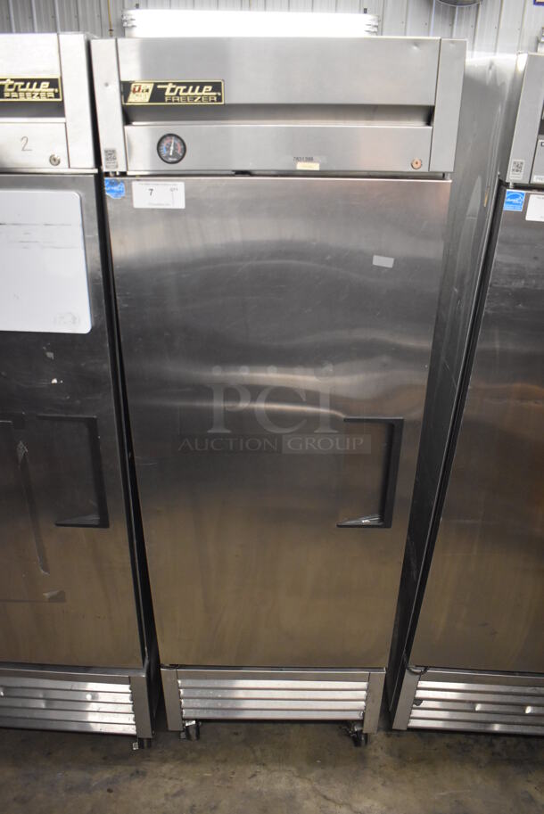2013 True T-23F ENERGY STAR Stainless Steel Commercial Single Door Reach In Freezer w/ Poly Coated Racks on Commercial Casters. 115 Volts, 1 Phase. 27x30x83.5. Tested and Powers On But Does Not Get Cold - Image 1 of 6