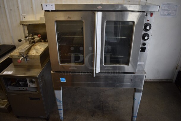 Blodgett Model SHO-100-E Stainless Steel Commercial Electric Powered Full Size Convection Oven w/ View Through Doors, Metal Oven Racks and Thermostatic Controls on Metal Legs. 208 Volts, 3 Phase. 38.5x40.5x57.