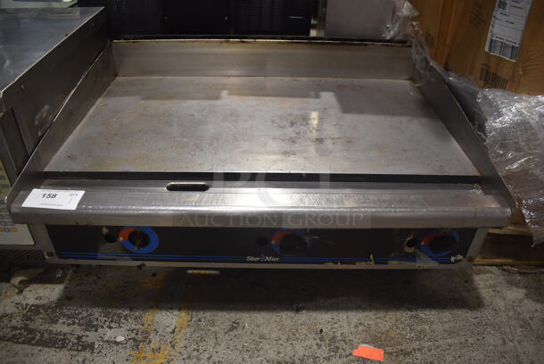 Star Max Stainless Steel Commercial Countertop Propane Gas Powered Flat Top Griddle.  - Image 1 of 4