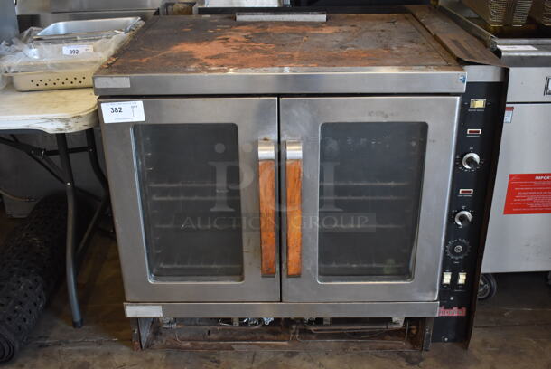 Vulcan Snorkel Stainless Steel Commercial Natural Gas Powered Full Size Convection Oven w/ View Through Doors, Metal Oven Racks and Thermostatic Controls. 40x40x35