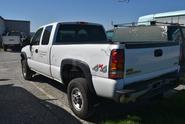 2005 GMC Sierra 4x4 4 Door Pick Up Truck. Odometer Reads 71,513. VIN 1GTHK29U45E234117. Title In Hand. Vehicle Runs and Drive. See Lot #8 For Additional Pictures. - Image 6 of 12