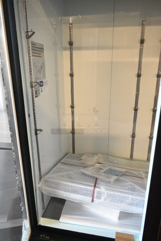 BRAND NEW SCRATCH AND DENT! 2024 Avantco 178GDC69HCB 78 1/4" Black Customizable Swing Glass Door Merchandiser Refrigerator with LED Lighting. See Pictures for Broken Glass. 115 Volts, 1 Phase. Tested and Working! - Image 5 of 8
