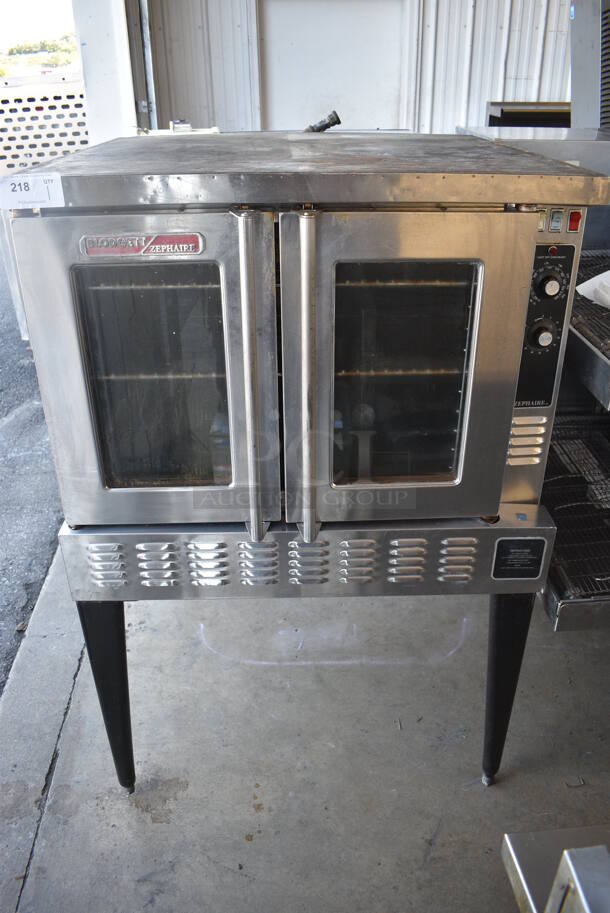 Blodgett Zephaire Stainless Steel Commercial Natural Gas Powered Full Size Convection Oven w/ View Through Doors, Metal Oven Racks and Thermostatic Controls on Metal Legs. 38x37x58