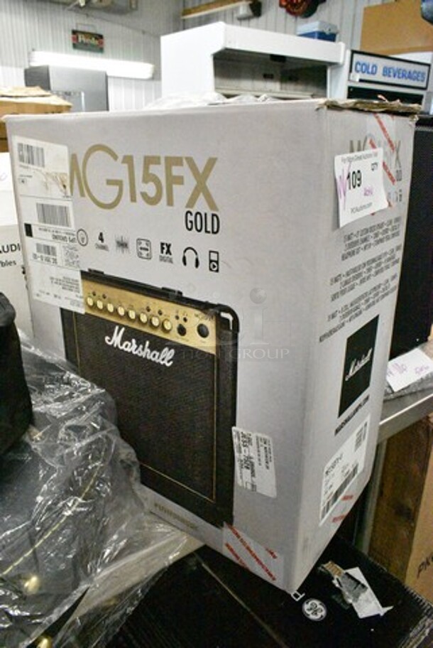 4 Items Including Schecter R022110323 Diamond Series 6 String Guitar, Marshall MG15FX Guitar Amp, Winzz 6 String Guitar in Soft Guitar Case, Guitar in TKL 0996475000 Case. 4 Times Your Bid!  - Image 2 of 12