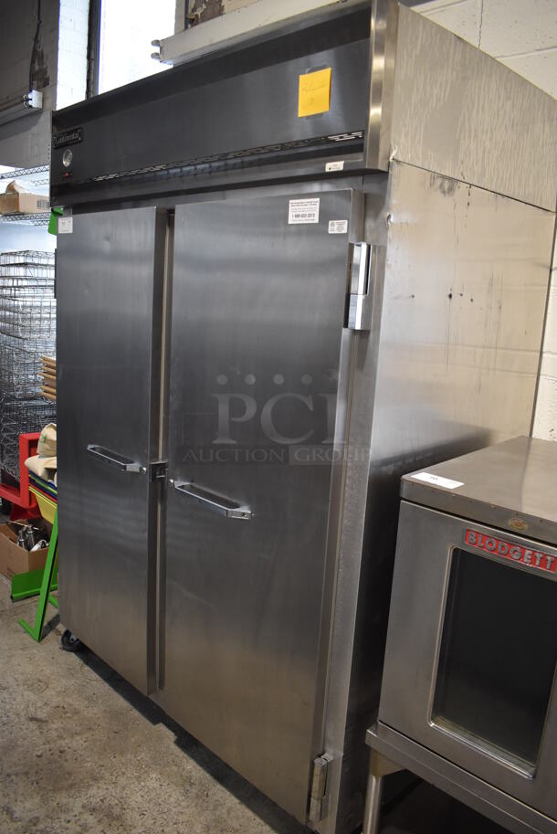 Continental 2RE Stainless Steel Commercial 2 Door Reach In Cooler on Commercial Casters. 115 Volts, 1 Phase. 54x36x82. Tested and Powers On But Does Not Get Cold - Image 2 of 7