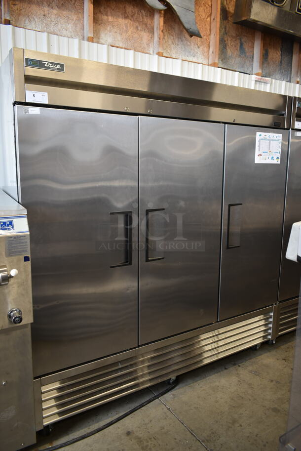 2017 True T-72F-HC Stainless Steel Commercial 3 Door Reach In Freezer w/ Poly Coated Racks on Commercial Casters. 115 Volts, 1 Phase. Tested and Working! - Image 1 of 9