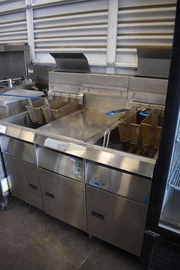 Pitco Frialator Model F14S-V Stainless Steel Commercial Floor Style Propane Gas 2 Bay Fryer w/ Center Dumping Station on Commercial Casters. 110,000 BTU. 49x32x54 - Image 3 of 10