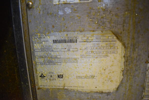 2012 Pitco Frialator SG14 Stainless Steel Commercial 2 Bay Natural Gas Powered Deep Fat Fryer w/ 4 Metal Fry Baskets on Commercial Casters. 110,000 BTU. 31.5x34x48 - Image 10 of 11