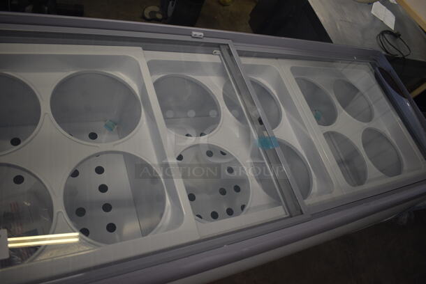 BRAND NEW SCRATCH AND DENT! Avantco ADC-12C-HC Curved Glass Ice Cream Dipping Cabinet - 71" on Commercial Casters 115 Volt, 1 Phase. Tested and Working! - Image 2 of 10