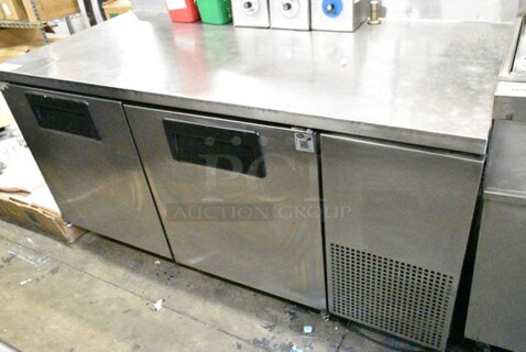 True TWT-67 Stainless Steel Commercial 2 Door Undercounter Cooler on Commercial Casters. 1 Caster Needs To Be Fixed. 115 Volts, 1 Phase. Tested and Working!