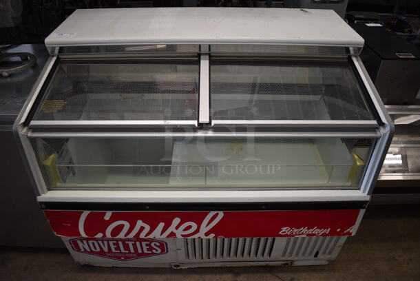 Hussmann Model LBN-4 Metal Commercial Novelty Ice Cream Cabinet w/ 2 Sliding Lids. 115 Volts, 1 Phase. 49x32x38.5. Tested and Powers On But Does Not Get Cold