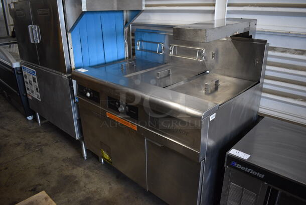 Frymaster Model FMPH255SC Stainless Steel Commercial Natural Gas Powered 2 Bay Deep Fat Fryer w/ Right Side Dumping Station on Commercial Casters. 80,000 BTU. 47x31x52