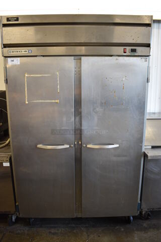 Beverage Air Model HR2-1S Stainless Steel Commercial 2 Door Reach In Cooler w/ Poly Coated Racks on Commercial Casters. 115 Volts, 1 Phase. 52x32x84. Tested and Working!