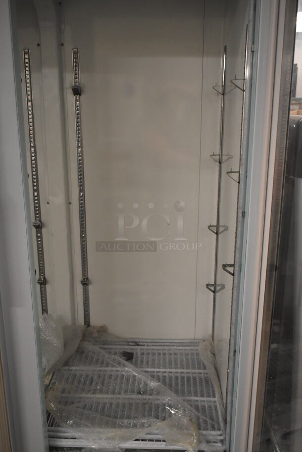 BRAND NEW SCRATCH AND DENT! 2023 Avantco 178GDC40HCW Metal Commercial 48" White Swing Glass Door Merchandiser Refrigerator with LED Lighting and Poly Coated Racks. 115 Volts, 1 Phase. Tested and Working! - Image 4 of 6