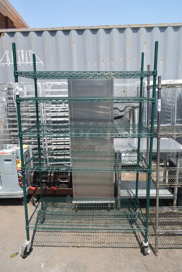 Green Finish 6 Tier Wire Shelving Unit on Commercial Casters. BUYER MUST DISMANTLE. PCI CANNOT DISMANTLE FOR SHIPPING. PLEASE CONSIDER FREIGHT CHARGES. - Image 1 of 5