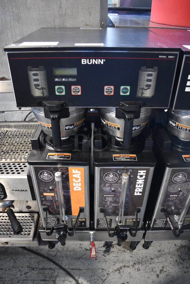 2012 Bunn Model DUAL SH DBC Stainless Steel Commercial Countertop Dual Coffee Machine w/ Hot Water Dispenser, 2 Stainless Steel Brew Baskets and 2 Bunn Model SH SERVER Satellite Servers. 120/208-240 Volts, 1 Phase. 18x24x36. Tested and Working!