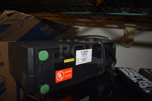 ALL ONE MONEY! Tier Lot of Various Items Including Samsung DVD Player, Keyboard, Remotes, Two-Line Business Telephones, and Denon Receiver - Image 5 of 8