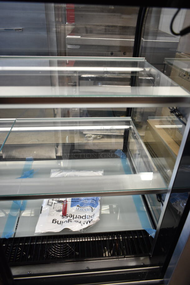BRAND NEW SCRATCH AND DENT! Avantco 193BC72HCB 72" Curved Glass Black Refrigerated Bakery Display Case. See Pictures for Side Glass Damage. 110-120 Volts, 1 Phase. Tested and Working! - Image 9 of 11