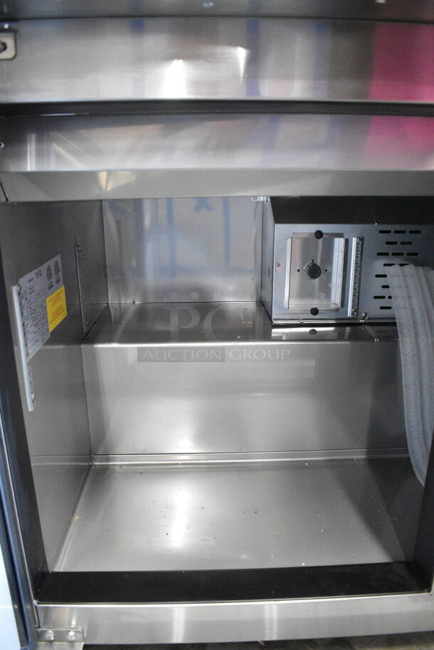 BRAND NEW SCRATCH AND DENT! 2024 Avantco 447APST72 Stainless Steel Commercial Sandwich Salad Prep Table Bain Marie Mega Top on Commercial Casters. 115 Volts, 1 Phase. Tested and Working! - Image 9 of 10