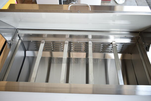BRAND NEW SCRATCH AND DENT! 2023 Avantco 178APT36HC Stainless Steel Commercial Sandwich Salad Prep Table Bain Marie Mega Top on Commercial Casters. 115 Volts, 1 Phase. Tested and Working! - Image 5 of 9