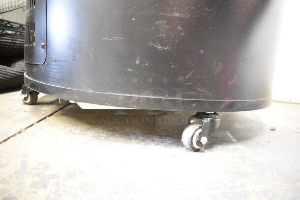 BRAND NEW SCRATCH AND DENT! Avantco 177BMF3B Metal Black Barrel Merchandiser Freezer on Commercial Casters. 110-120 Volts, 1 Phase. Tested and Working! - Image 6 of 7
