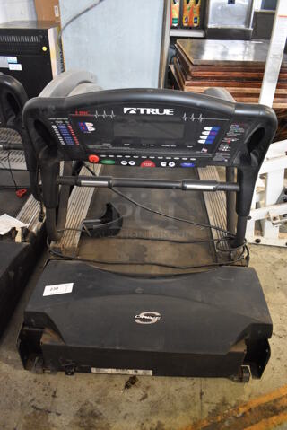 True Model ZTX 850HRC Treadmill. Comes In Two Pieces. 120 Volts, 1 Phase. 33x77x11, 33x28x53