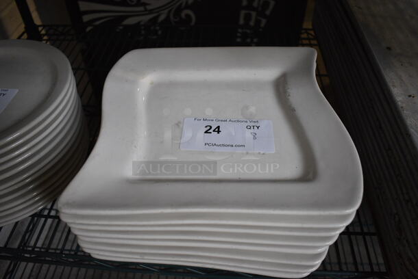 8 White Ceramic Plates. 10x10x1. 8 Times Your Bid!