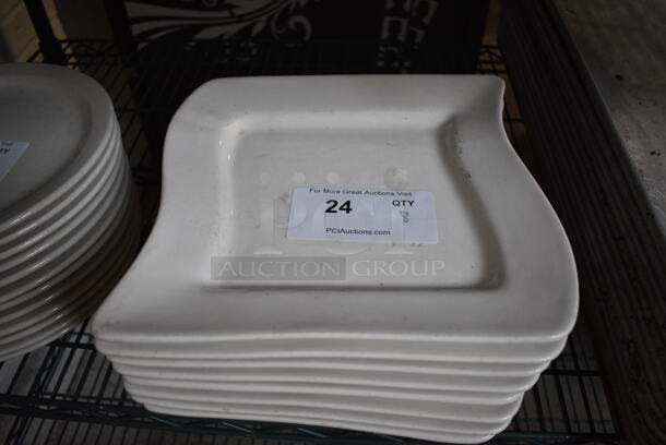 8 White Ceramic Plates. 10x10x1. 8 Times Your Bid! - Image 1 of 3