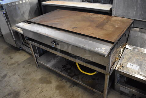 Imperial Stainless Steel Commercial Countertop Natural Gas Powered Flat Top Griddle on Stainless Steel Equipment Stand w/ Under Shelf. 48x31x31