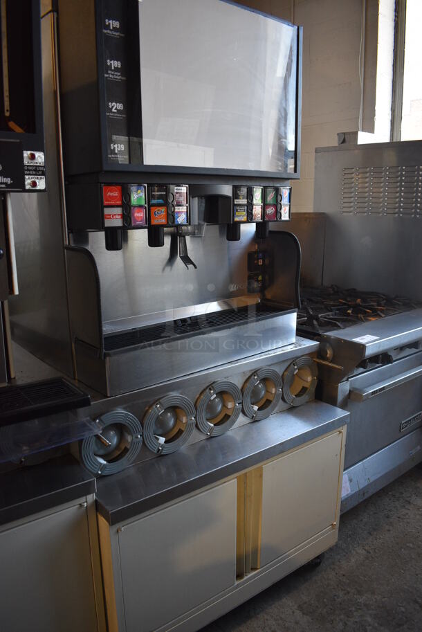 2017 Lancer Model FS30 Stainless Steel Commercial Countertop 16 Flavor Carbonated Beverage Machine on Stainless Steel Soda Station w/ 5 Cup Dispensers and 2 Doors. 115 Volts, 1 Phase. 36x43x75 - Image 2 of 8