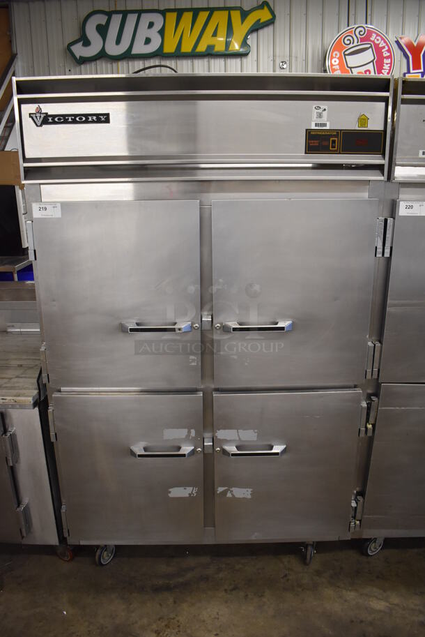 Victory Stainless Steel Commercial 4 Half Size Door Reach In Cooler w/ Poly Coated Racks on Commercial Casters. 52x36x84. Tested and Powers On But Does Not Get Cold