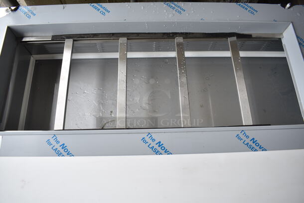 BRAND NEW SCRATCH AND DENT! Beverage Air SPE60HC-10 Stainless Steel Commercial Elite Series 60" 2 Door Refrigerated Sandwich Prep Table on Commercial Casters. 115 Volts, 1 Phase. Tested and Working! - Image 4 of 12