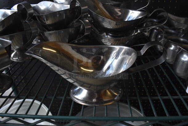 21 Metal Gravy Boats. 9.5x4.5x4. 21 Times Your Bid!