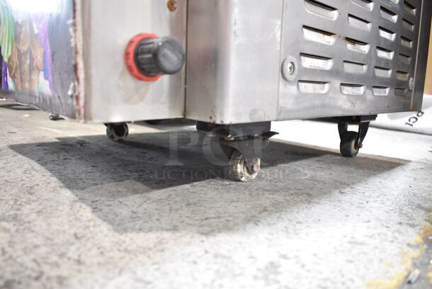 2013 Stainless Steel Commercial 2 Flavor w/ Twist Soft Serve Ice Cream Machine on Commercial Casters. 220 Volts.  - Image 7 of 8