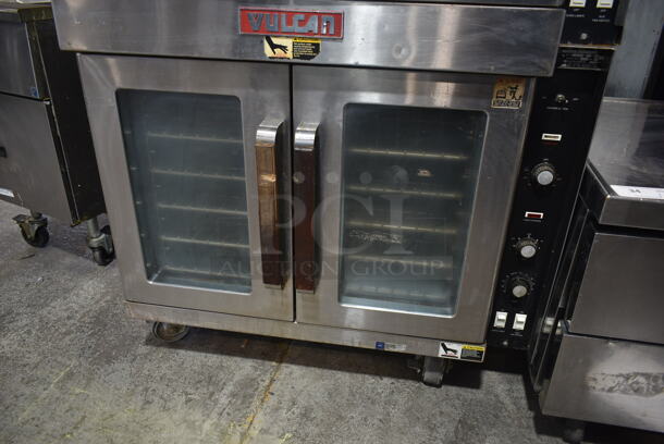 2 Vulcan ET88T Stainless Steel Commercial Electric Powered Full Size Convection Oven w/ View Through Doors, Metal Oven Racks and Thermostatic Controls on Commercial Casters. 480 Volts, 3 Phase. 2 Times Your Bid! - Image 2 of 8