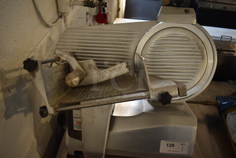 Univex 7512 Stainless Steel Commercial Countertop Meat Slicer w/ Blade Sharpener. 115 Volts, 1 Phase. 22x23x22. Tested and Working!