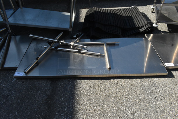 Stainless Steel Tabletop w/ Metal Legs.