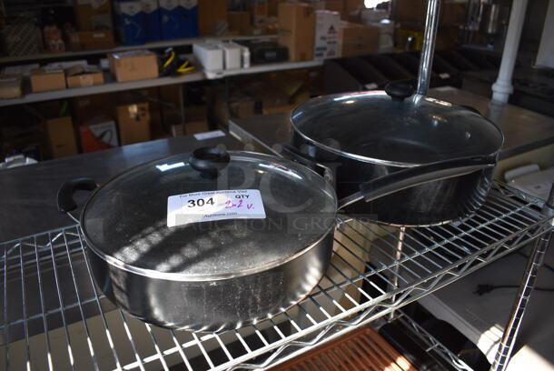 2 Metal Sauce Pots w/ Lids. 21.5x12x7, 18x14x8. 2 Times Your Bid! - Image 1 of 3