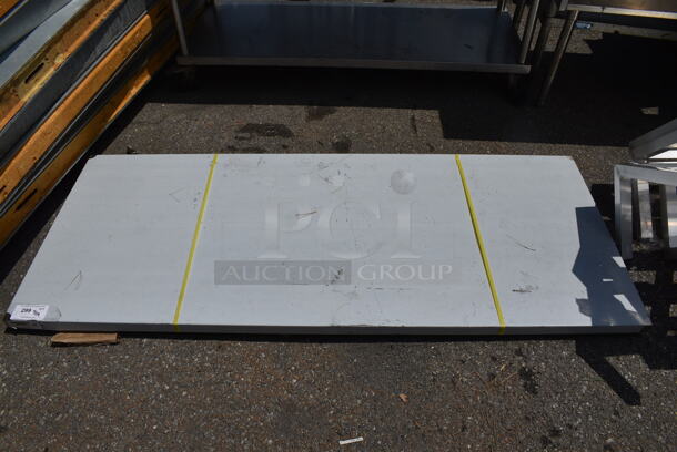 BRAND NEW SCRATCH AND DENT! Regency 600T3072G 30" x 72" 18-Gauge 304 Stainless Steel Commercial Work Table with Galvanized Legs and Undershelf.  - Image 2 of 4