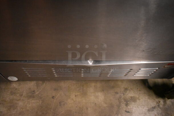 Garland PS-24G-6-2628 Stainless Steel Commercial Natural Gas Powered 6 Burner Range w/ Left Side Flat Top, 2 Ovens, Over Shelf and Back Splash.  - Image 6 of 11