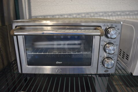 Oster Stainless Steel Countertop Toaster Oven. 16.5x13x10
