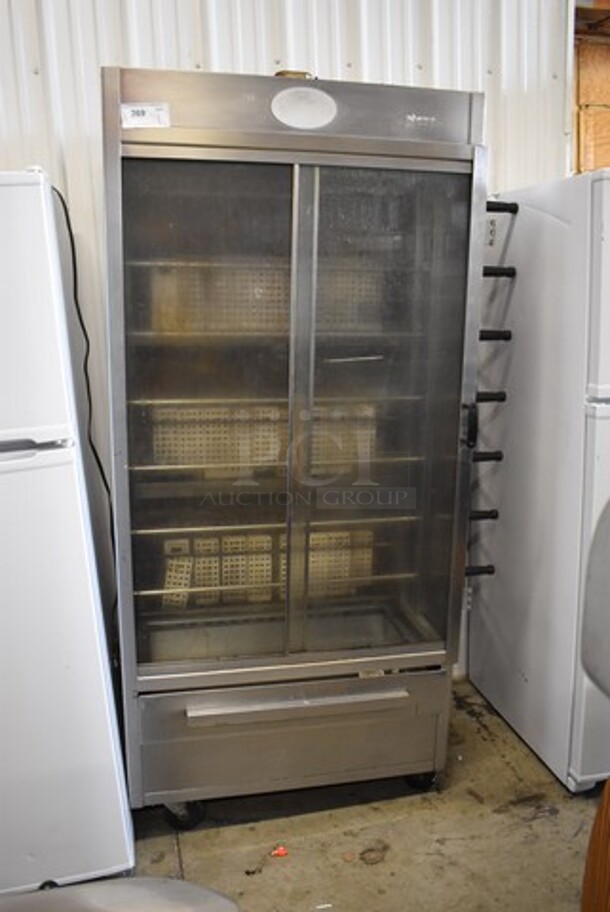 Olde Hickory Stainless Steel Commercial Natural Gas Powered 7 Spit Rotisserie Oven on Commercial Casters. 45x23x75 - Image 2 of 10