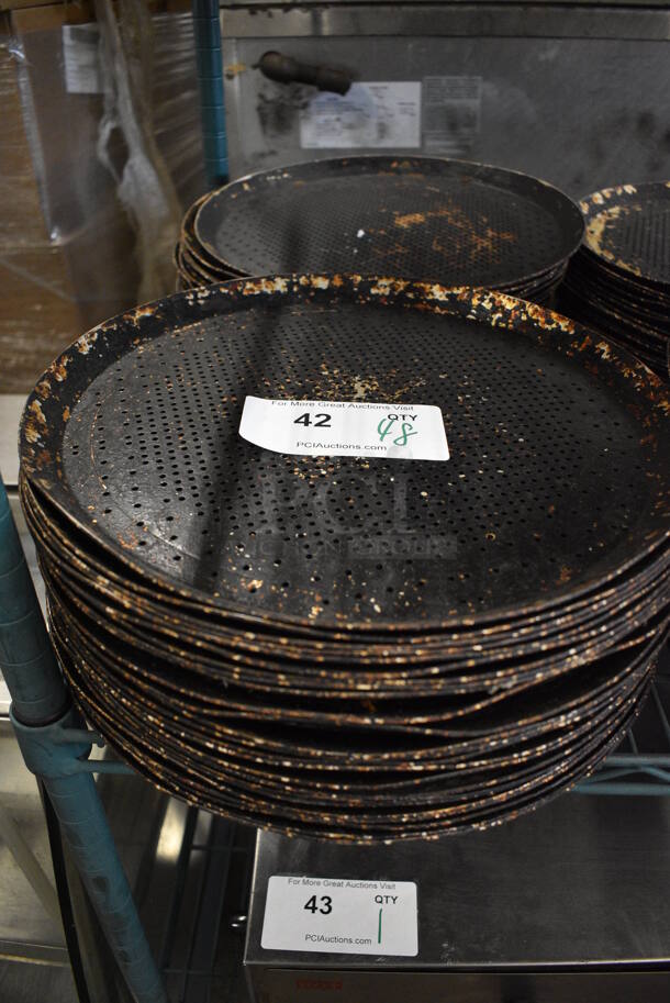 48 Metal Perforated Round Baking Pans. 13.25x13.25x1. 48 Times Your Bid!