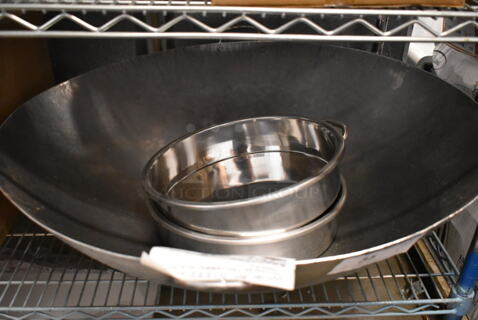 ALL ONE MONEY! Lot of 3 BRAND NEW SCRATCH AND DENT! Items; 
Town 34730 30" Hand Hammered Cantonese Wok and 2 Metal Round Pans. 