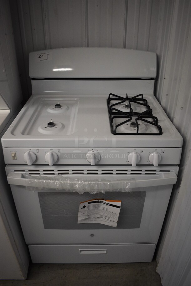 General Electric Metal Natural Gas Powered 4 Burner Range w/ Oven and Warmer. Missing Parts. Contains a Liquid Propane Conversion Kit! Appears To Be BRAND NEW! 30x30x46
