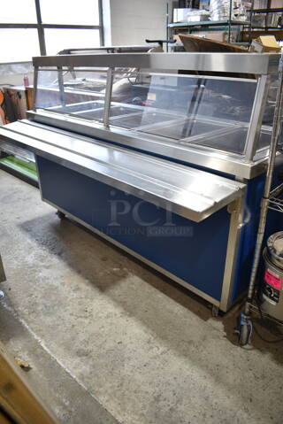 Servolift Eastern 501-5 Stainless Steel Commercial Portable 5 Well Steam Table w/ Tray Slide on Commercial Casters. 120/208 Volts, 1 Phase. 