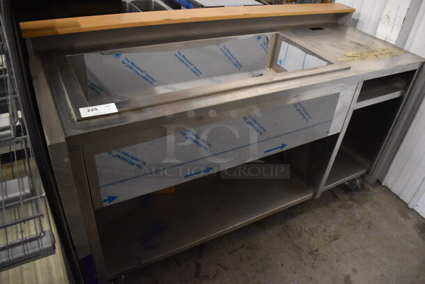 APPEARS NEW! Stainless Steel Commercial Portable Bar w/ Ice Bin and Under Shelf on Commercial Casters. 70x29x39 - Image 1 of 5