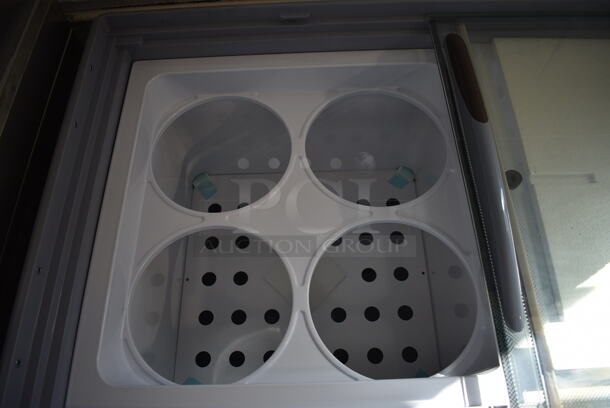 BRAND NEW SCRATCH AND DENT! 2021 Avantco Model 360ADC8HC Metal Commercial Chest Display Freezer w/ 2 Sliding Doors on Commercial Casters. 115 Volts, 1 Phase. 49x28x34.5. Tested and Working! - Image 4 of 7